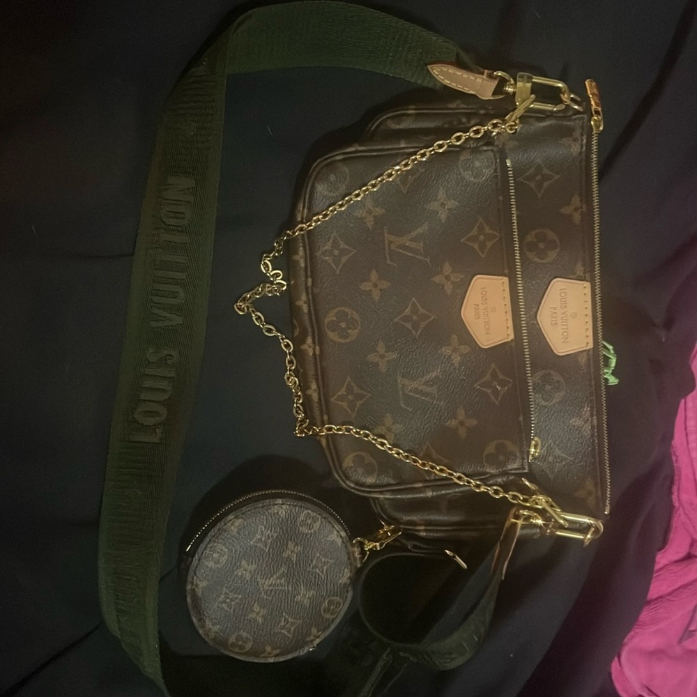 MULTI POCHETTE. Authentic,comes with all bags and strap!